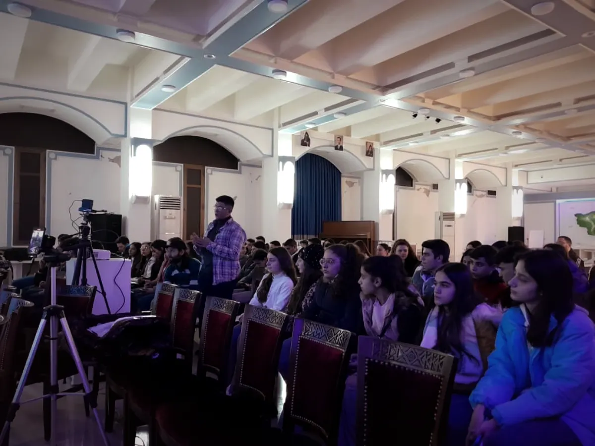 My AI presentation at the youth club's international AI event